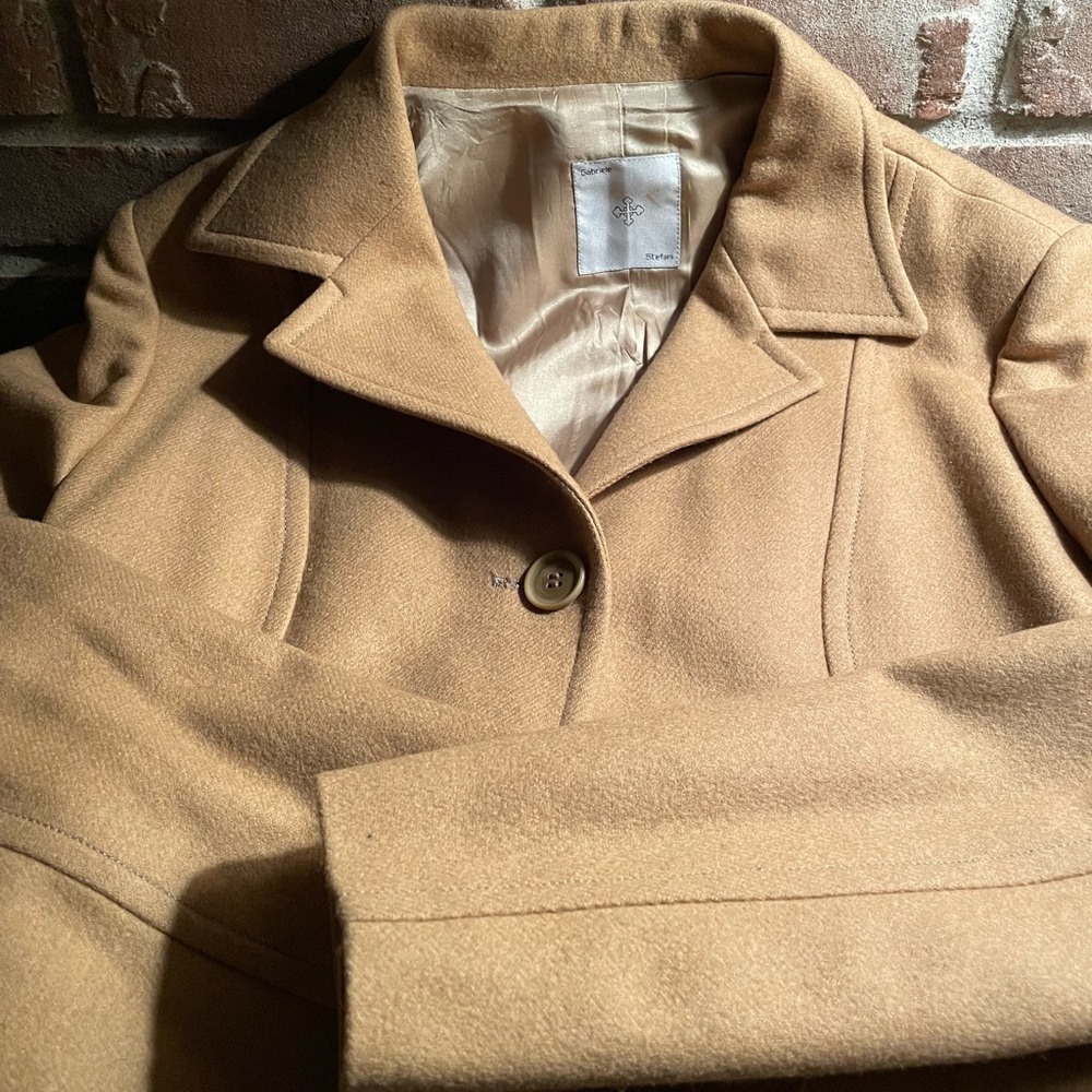 100% Cashmere over coat to dress up or down. Excellent condition.
